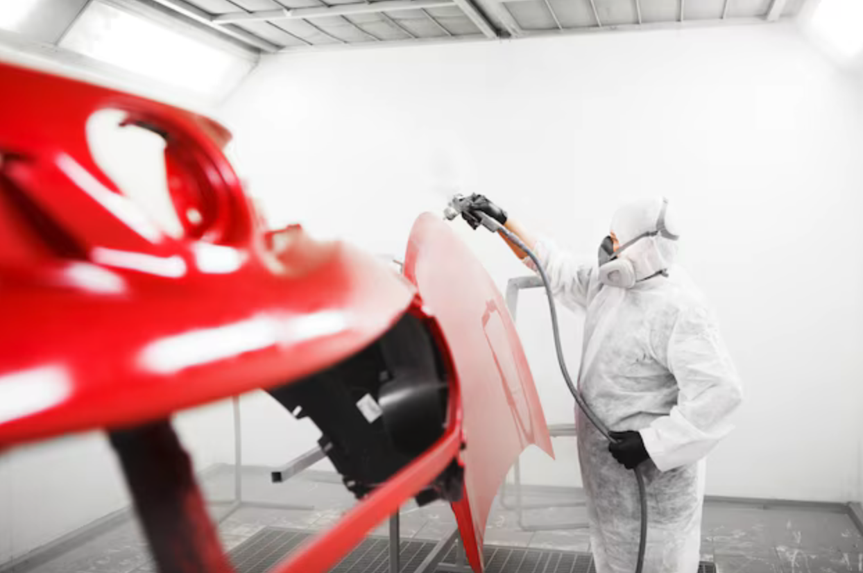 LMG repair centre workshop with vehicles on lifts